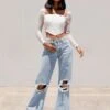 Princess Polly Maple Flare Jeans Knee Rips Light Wash Denim -Polly Store MAPLE FLARE JEANS KNEE RIPS LIGHT WASH DENIM 1